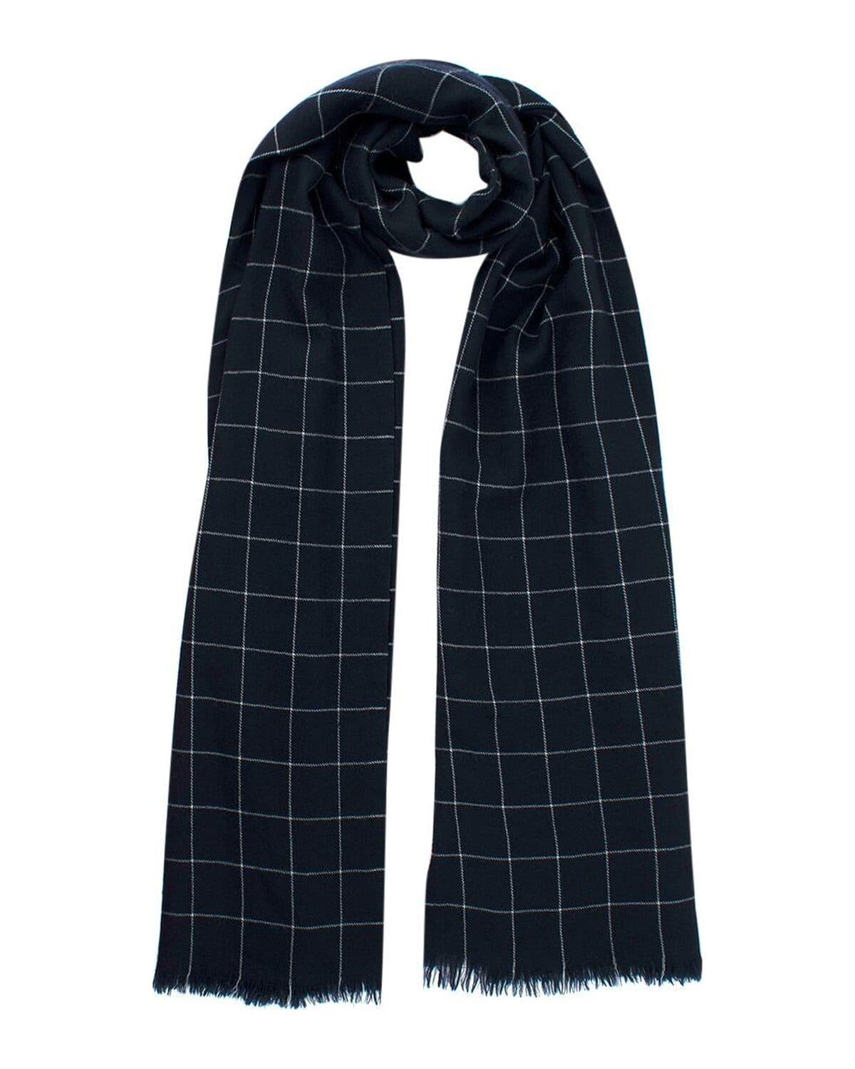 Checked cashmere scarf, navy photographed on a neutral ground